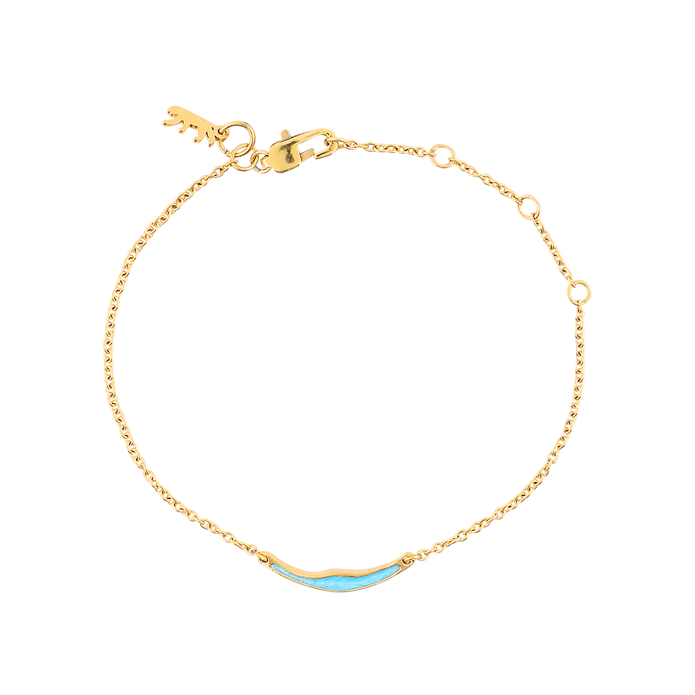 Gold bracelet with a blue wave design on a white background