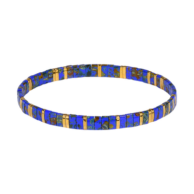 Blue and gold beaded bracelet on a white background