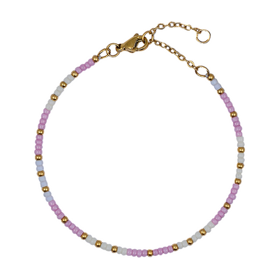 Beaded bracelet with pink, white, and gold beads on a white background