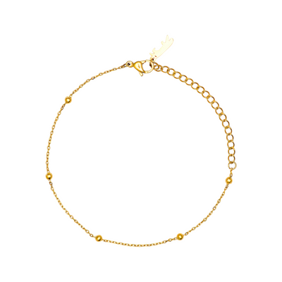 Gold bracelet on a white background