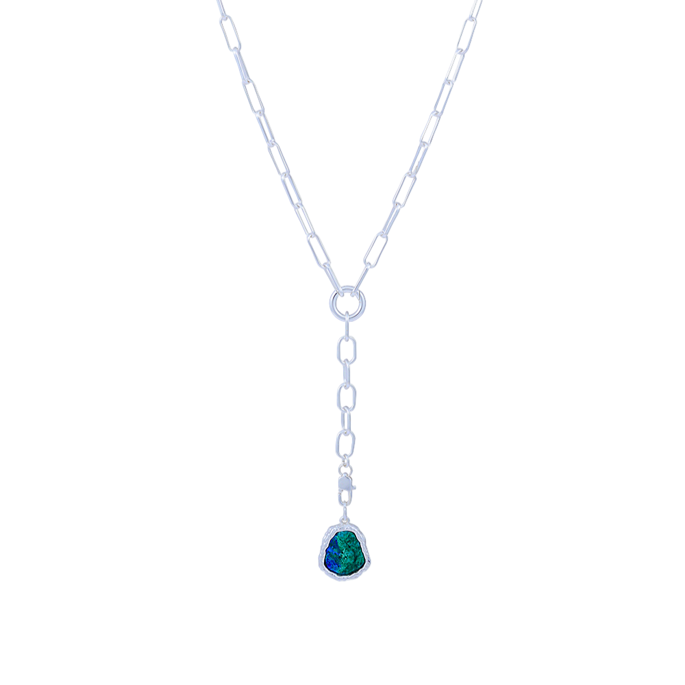 Necklace with a green teardrop pendant on a white background