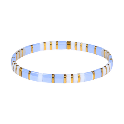 Bracelet with blue, gold, and white striped pattern on a white background