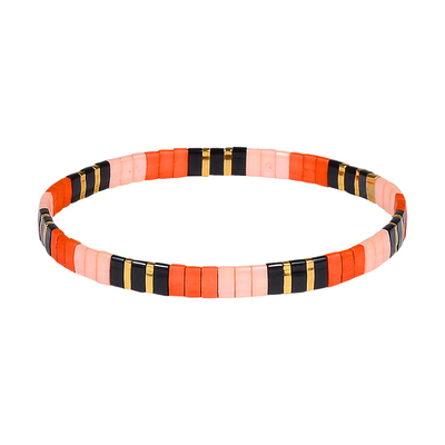 Colorful beaded bracelet with black, orange, pink, and gold pattern on a white background